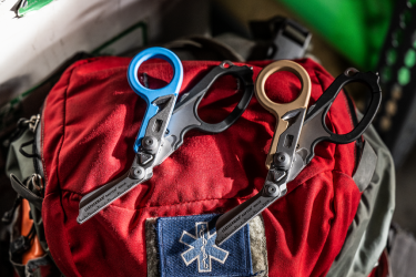 Two Raptor Rescues sitting on a medical bag