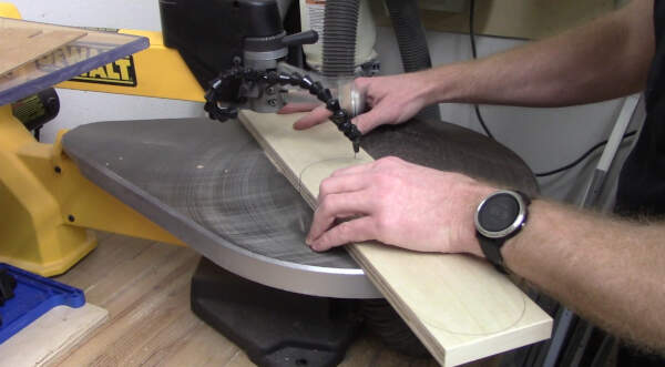 cut the throat plate curves with a scroll saw